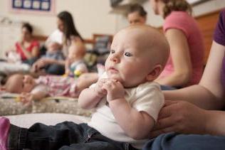 Baby with parent at WHRC event